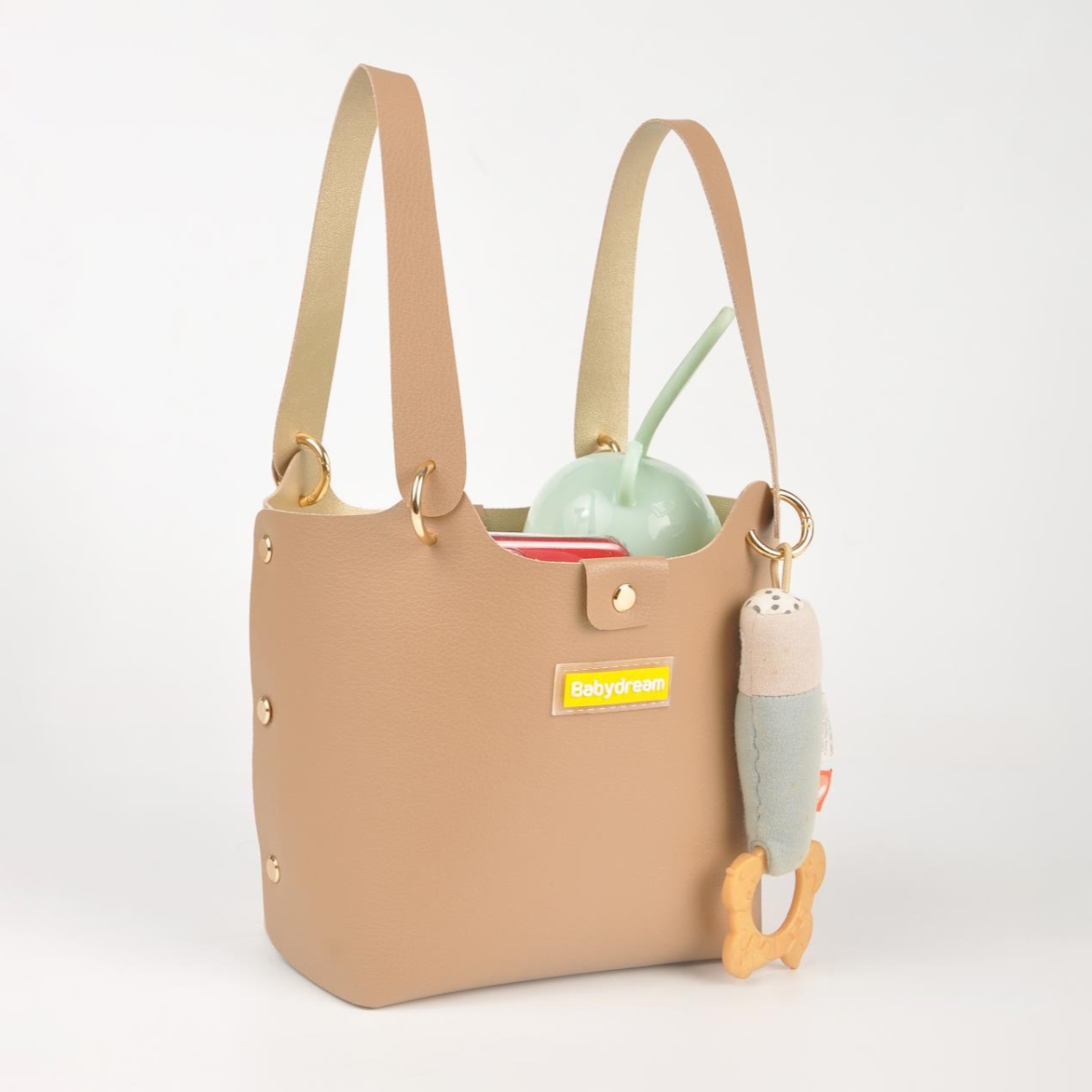 بيبي دريم حقيبة حفاضات جلدية بلون بيج للجنسين من عمر 13 سنة فما فوق