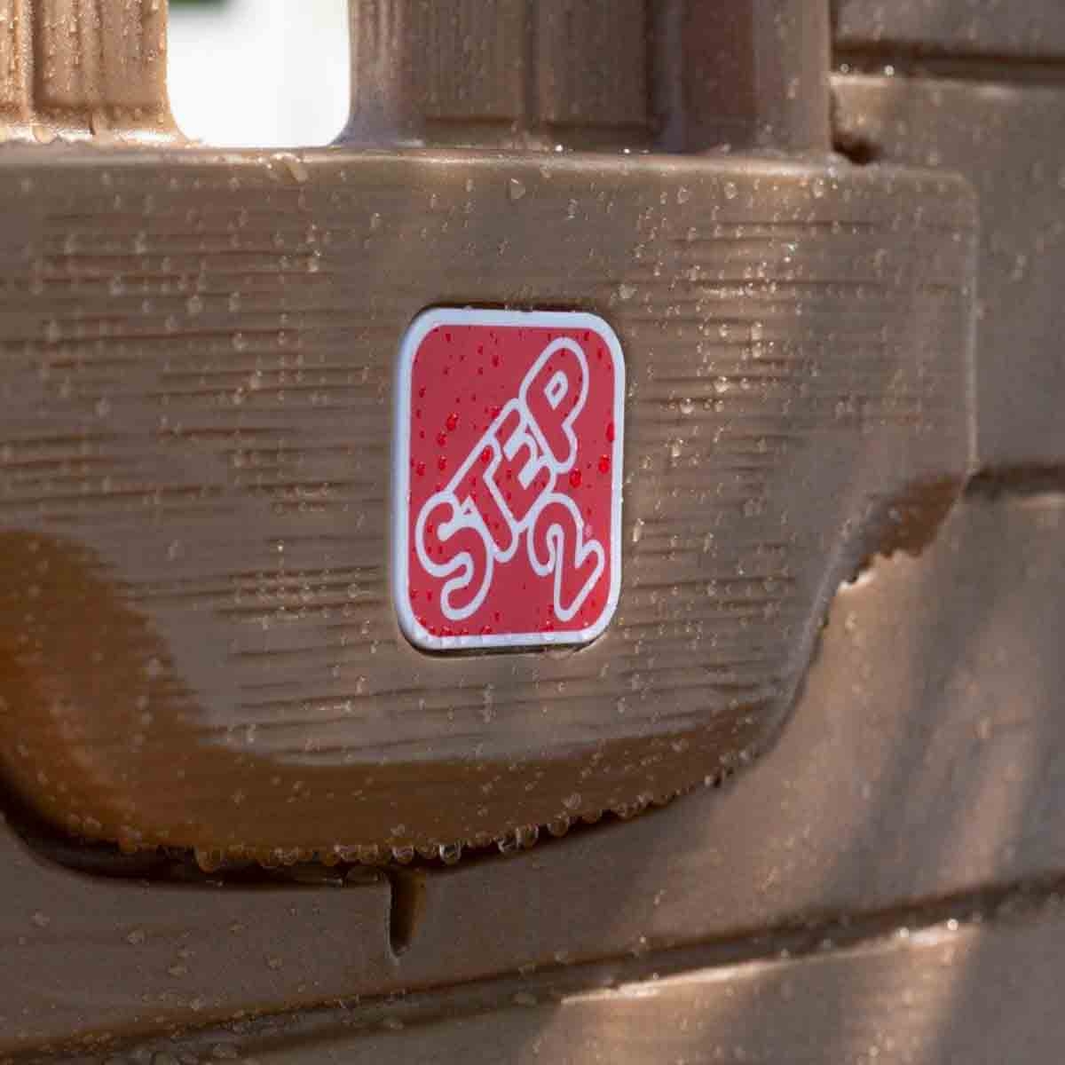 ستيب 2 مركز لعب ادفينشر لودج مع مقعد متأرجح للجنسين، 3-4 سنوات